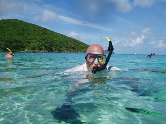 Crystal clear.  Jeff is over 6' and you can still see his fins.